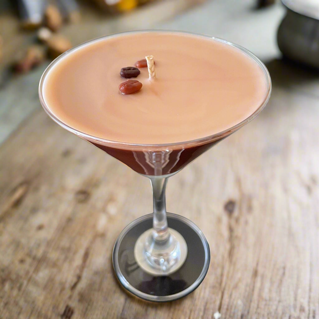 Cocktail in a martini glass with a dark background